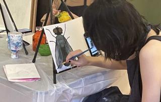 Girl painting at Centauri Arts Visual Art Class