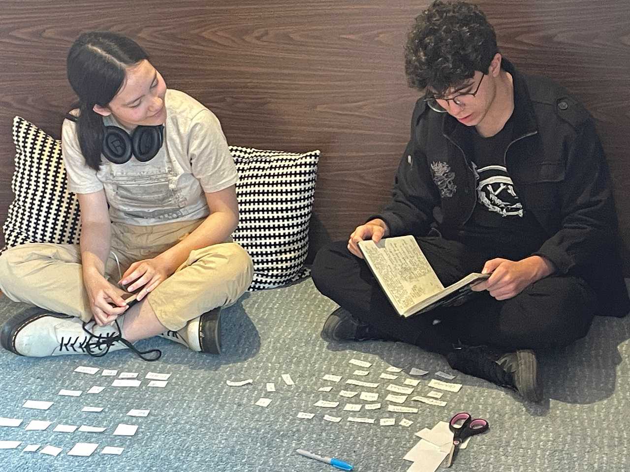 2 teens writing